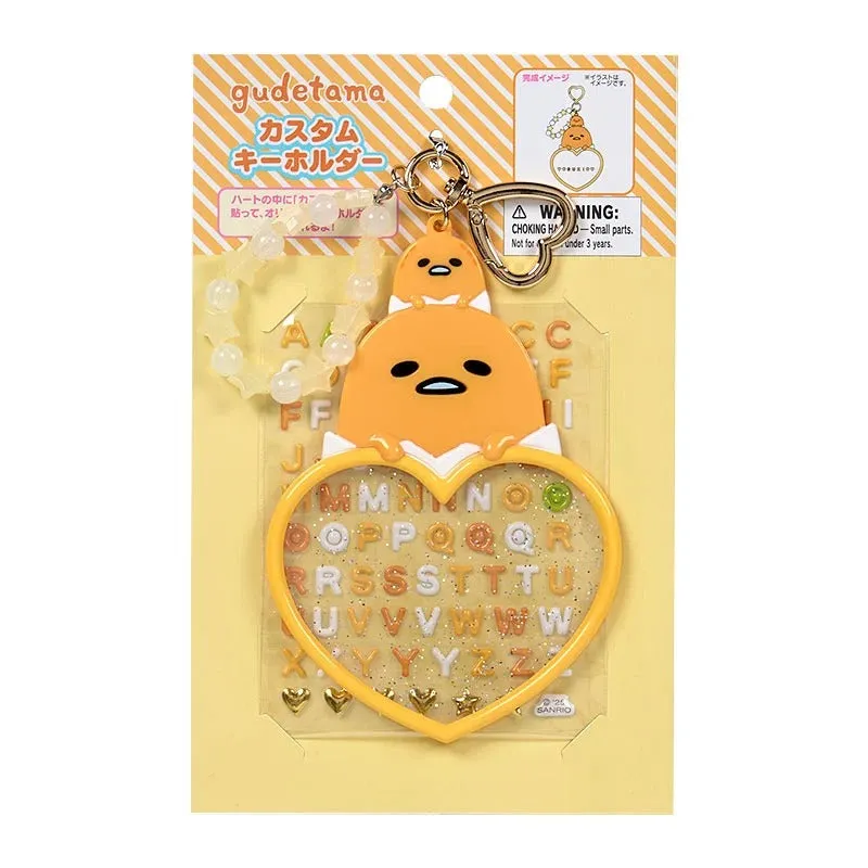 Hello Kitty Sanrio Character Award Gudetama nøkkelring med klistremerker