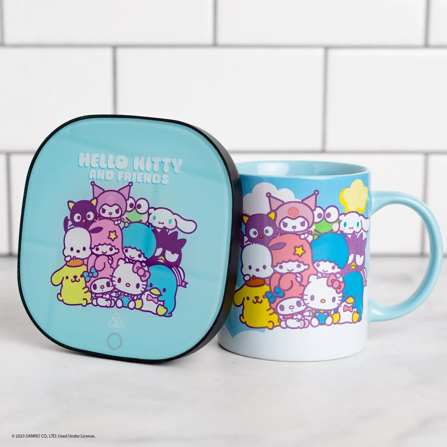 Hello Kitty and Friends koppvarmer med krus 355 ml