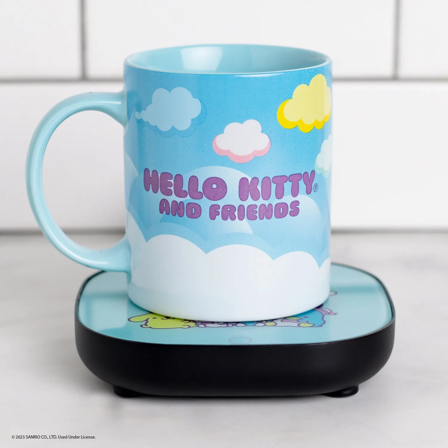 Hello Kitty and Friends koppvarmer med krus 355 ml